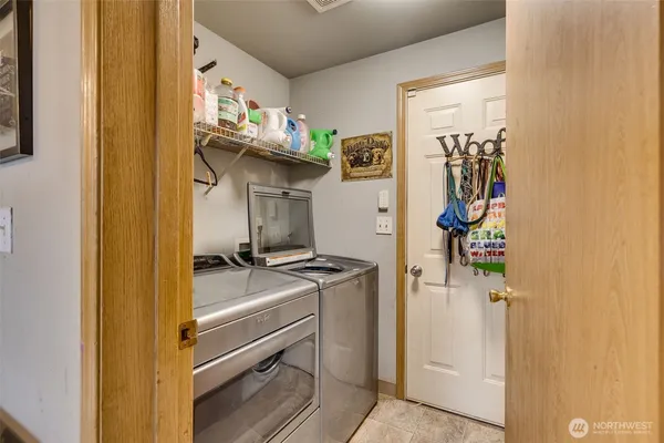 a storage room with washer and dryer