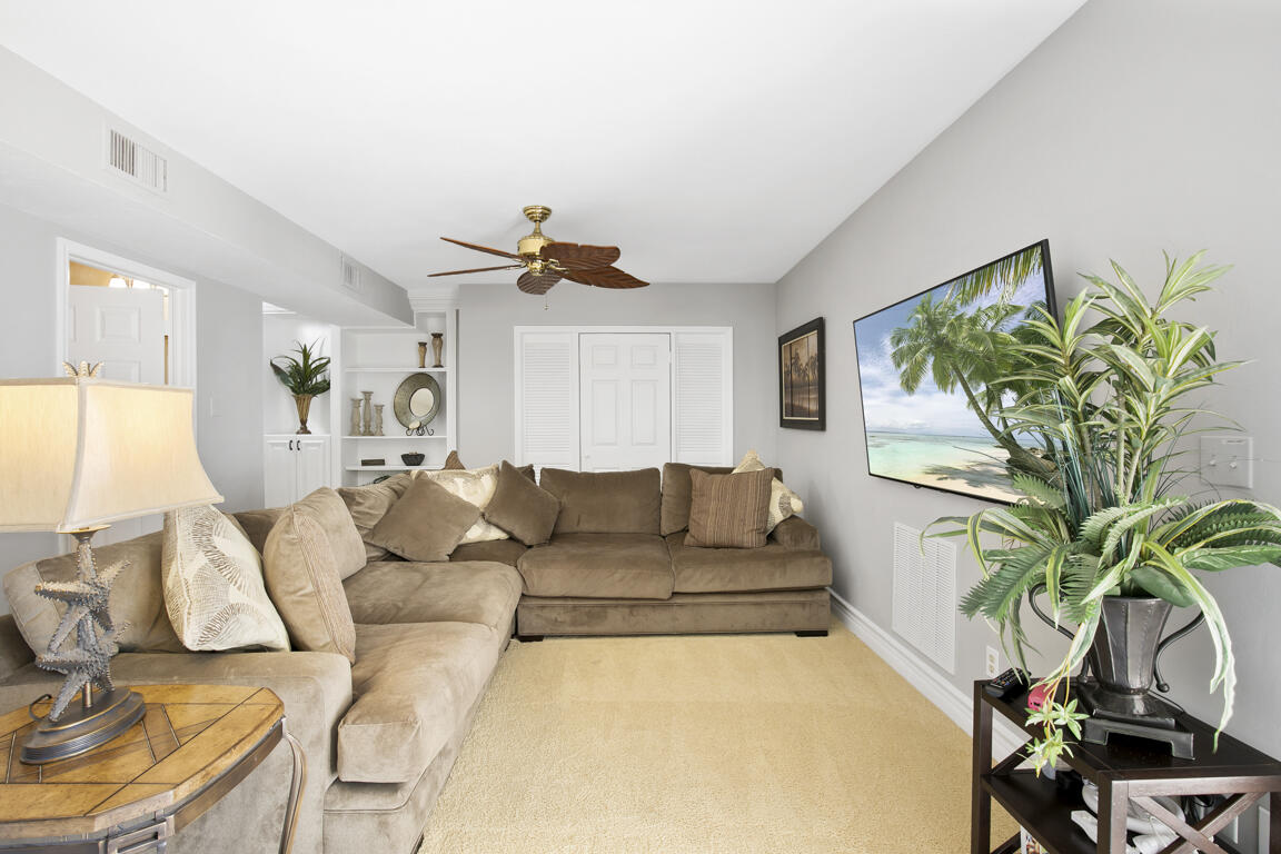 110 June Court Marco Island, FL 34145 - Photo 21 of 41 a living room with furniture and a potted plant