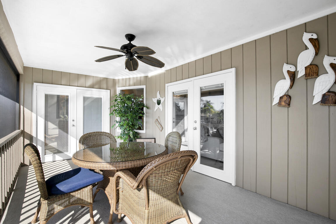 110 June Court Marco Island, FL 34145 - Photo 25 of 41 a dining room with furniture and window