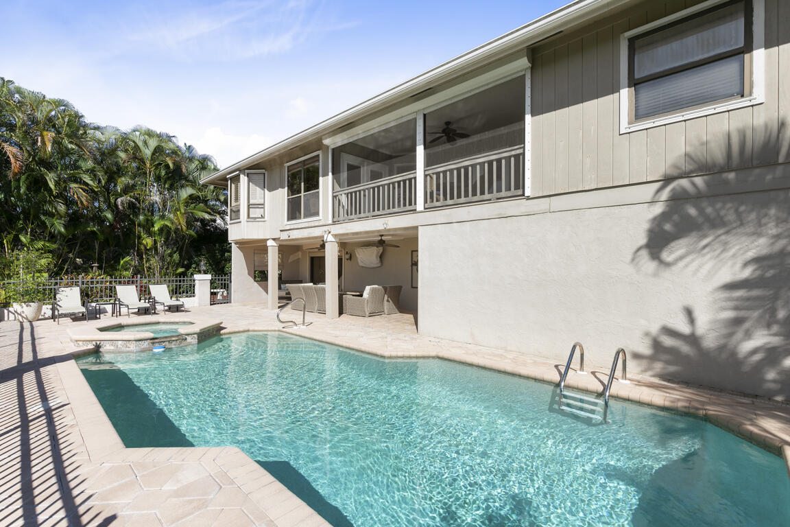 110 June Court Marco Island, FL 34145 - Photo 30 of 41 a house view with a garden space