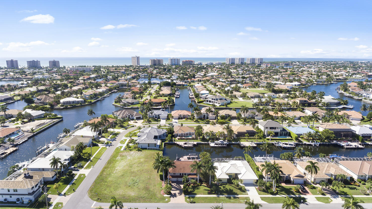 110 June Court Marco Island, FL 34145 - Photo 39 of 41 an aerial view of residential building and lake