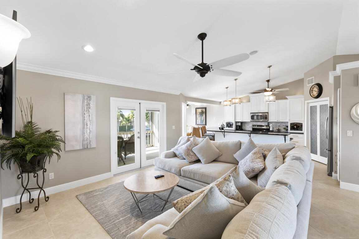 110 June Court Marco Island, FL 34145 - Photo 5 of 41 a living room with furniture and a large window