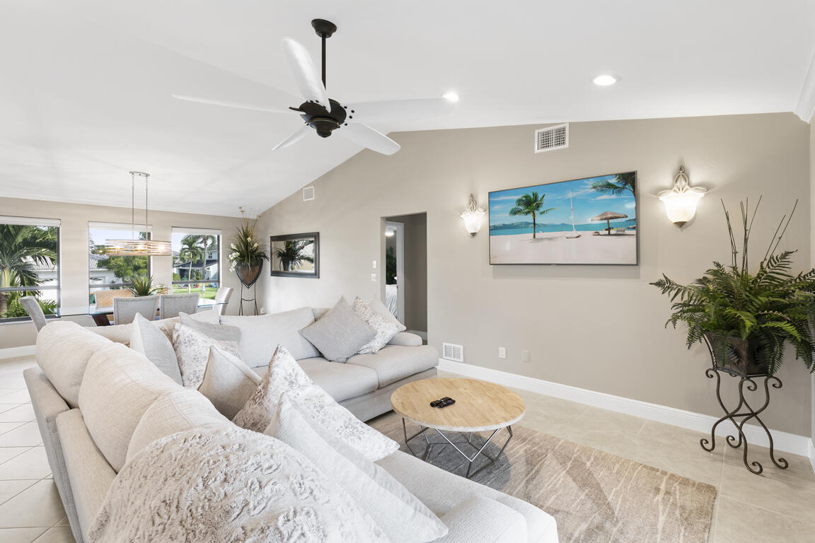 110 June Court Marco Island, FL 34145 - Photo 7 of 41 a living room with furniture potted plant and a lamp