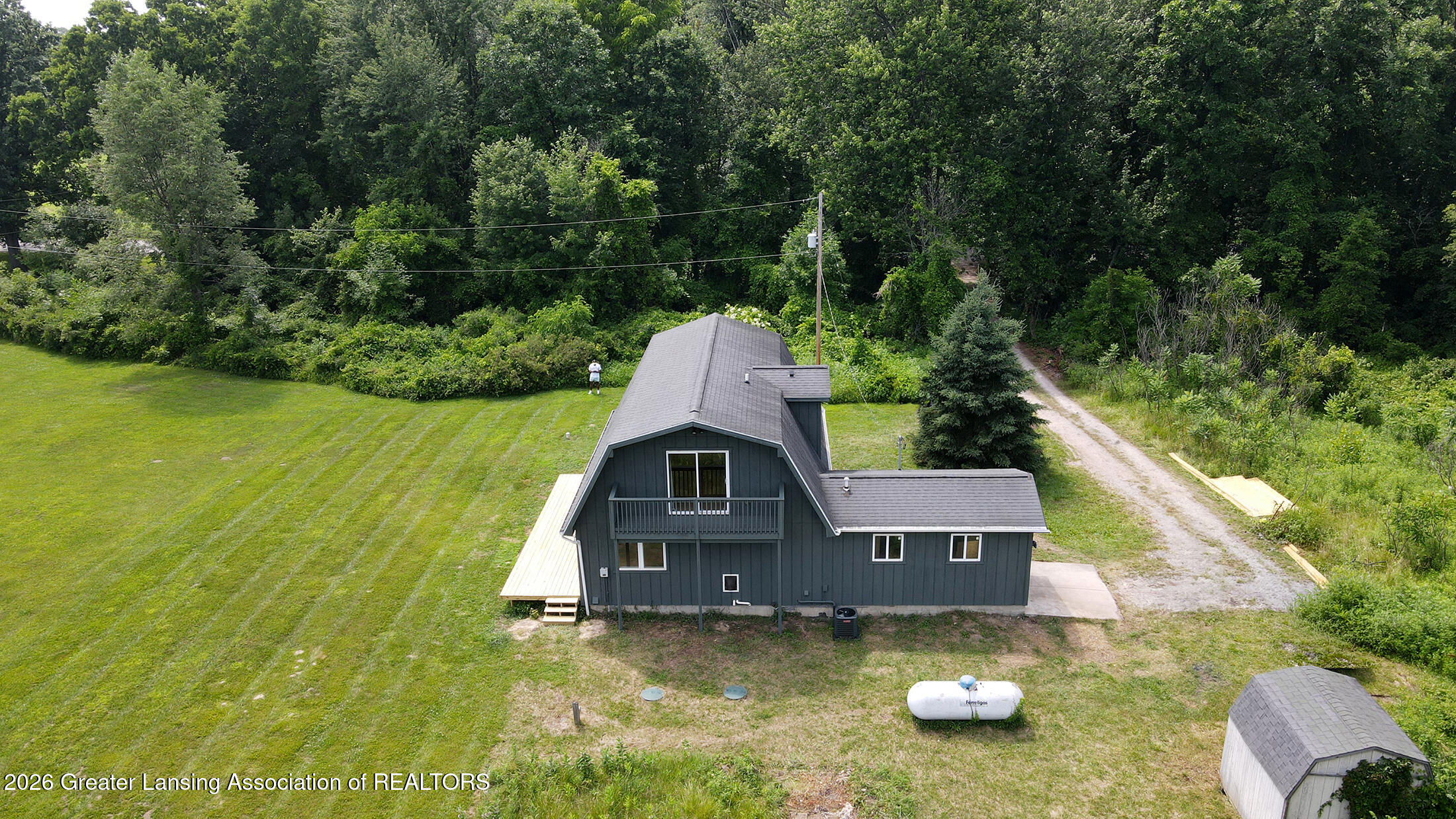 1264 North Edgar Road Mason, MI 48854 - Photo 2 of 36 dji_fly_20260702_153042_3_1783020653267_