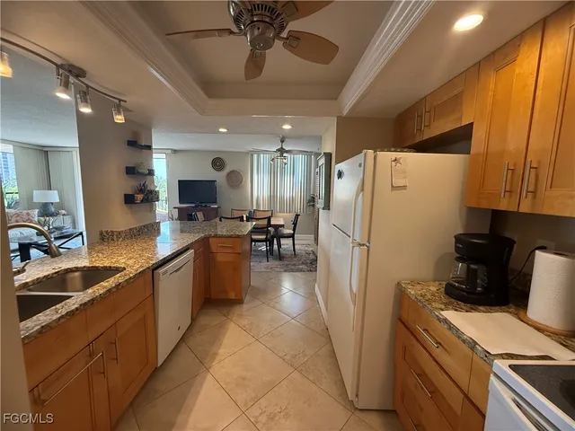 a view of a balcony with chairs
