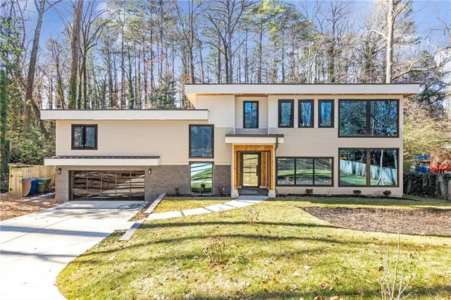 a view of house with a swimming pool