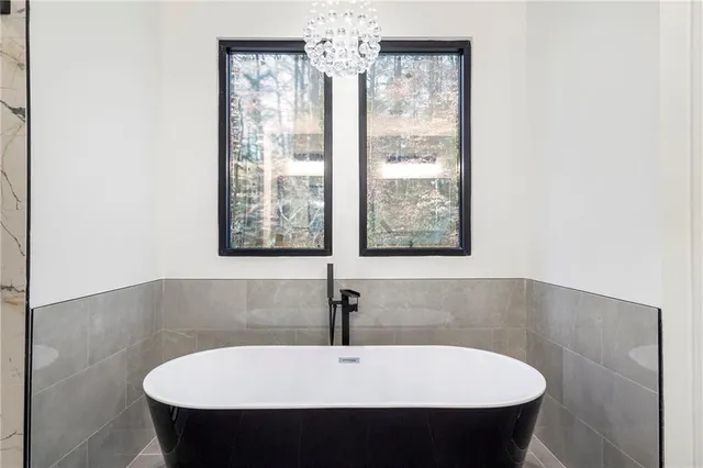 a bathroom with a sink and a bathtub