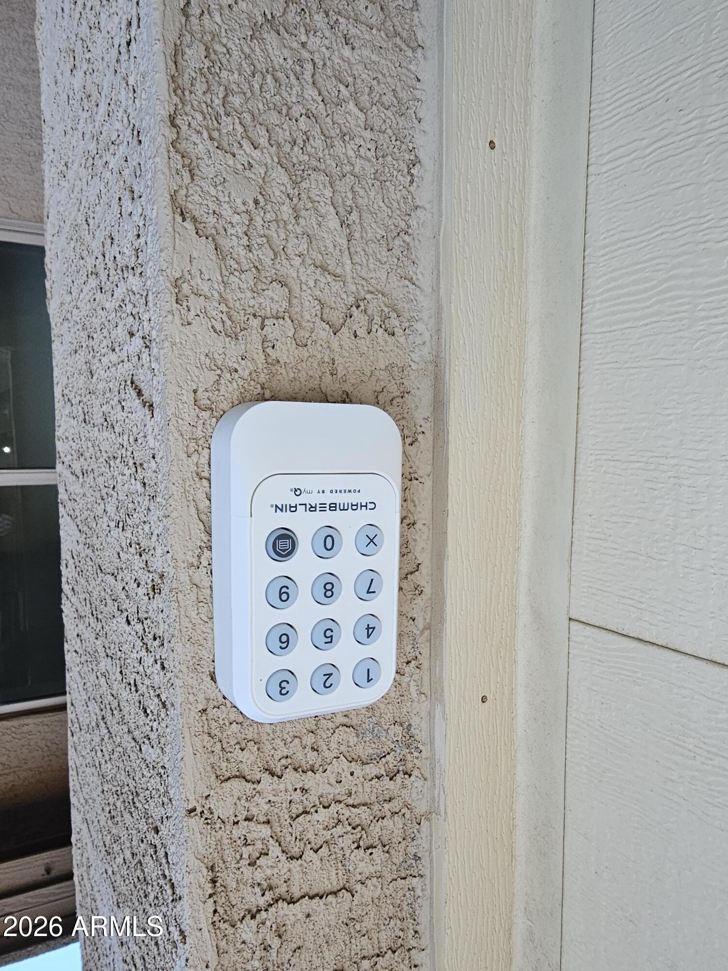4574 East Murrieta Road Gilbert, AZ 85297 - Photo 42 of 71 NEW KEY PAD FOR GARAGE ACCESS