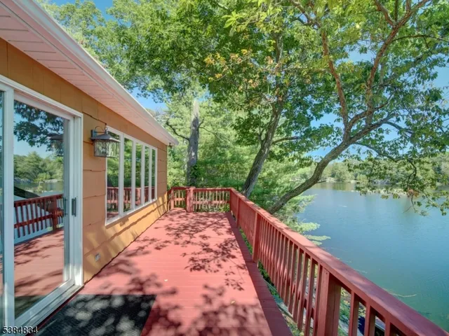 a view of balcony and yard