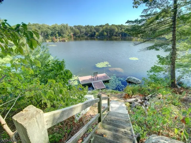 a view of a lake with a yard