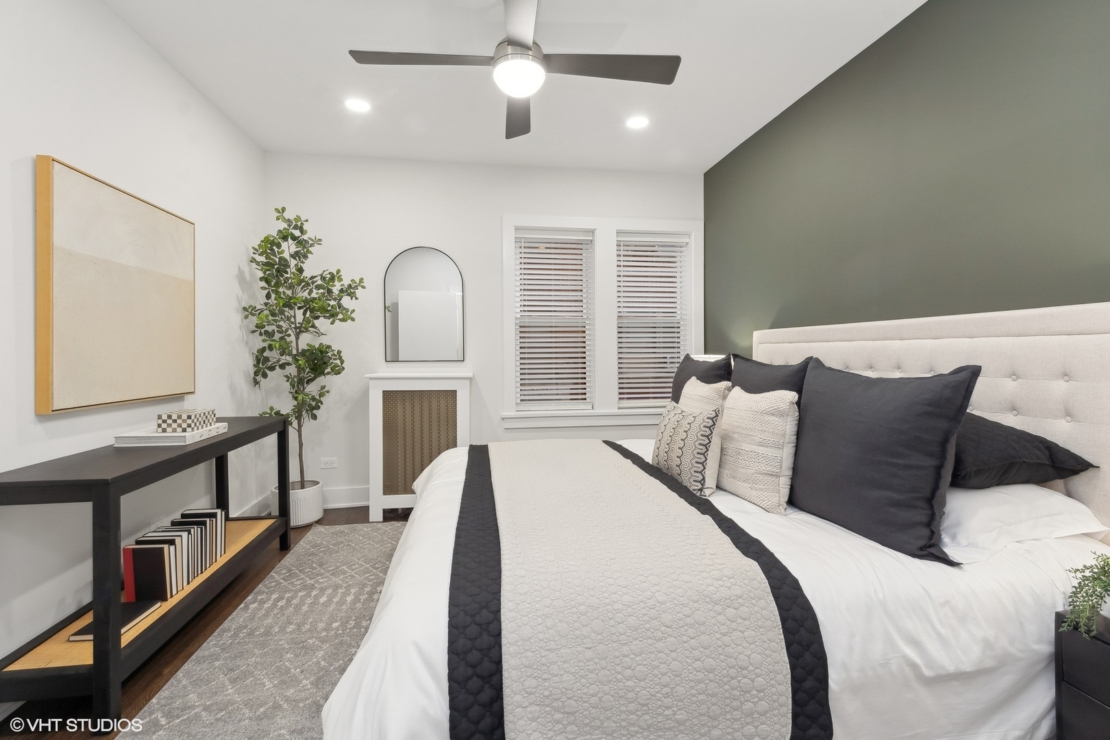 1323 West Addison Street, Unit 1A Chicago, IL 60613 - Photo 12 of 15 a bedroom with bed and a large window