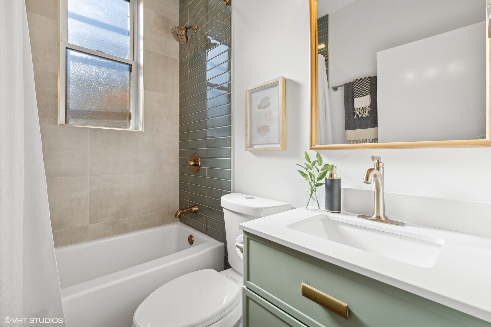 1323 West Addison Street, Unit 1A Chicago, IL 60613 - Photo 15 of 15 a bathroom with a granite countertop sink a toilet and bathtub