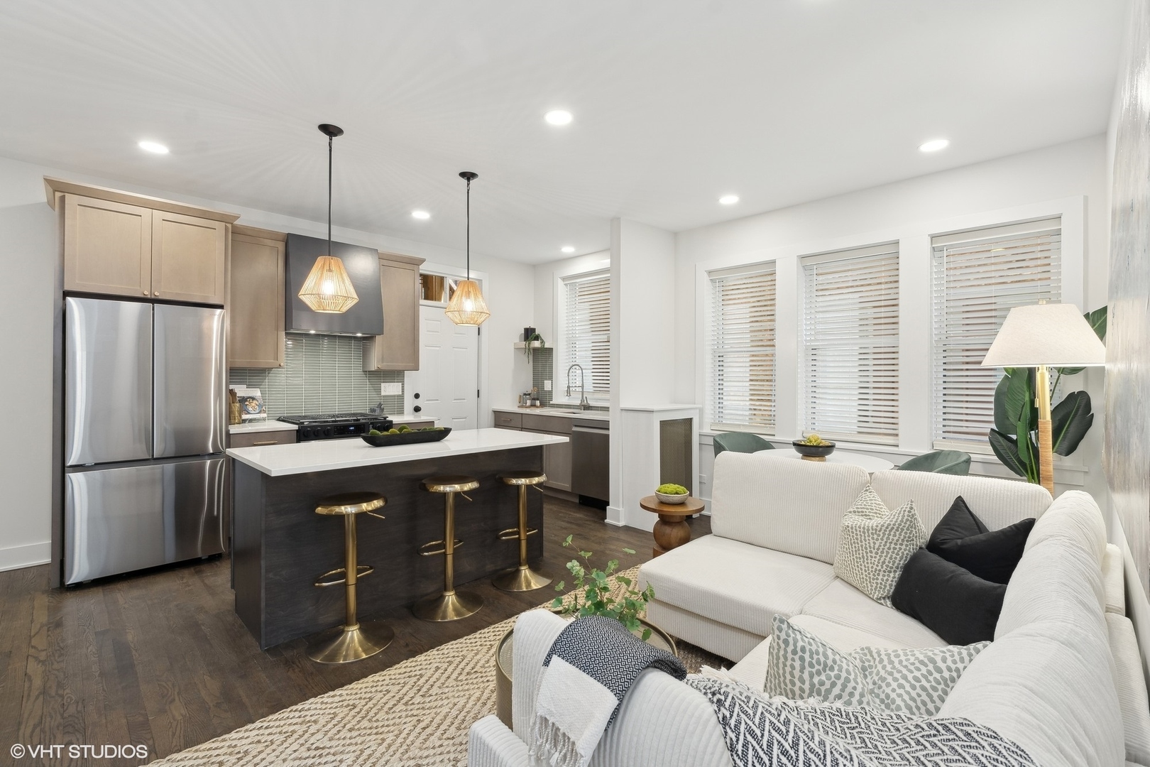 1323 West Addison Street, Unit 1A Chicago, IL 60613 - Photo 2 of 15 a large kitchen with a table and chairs