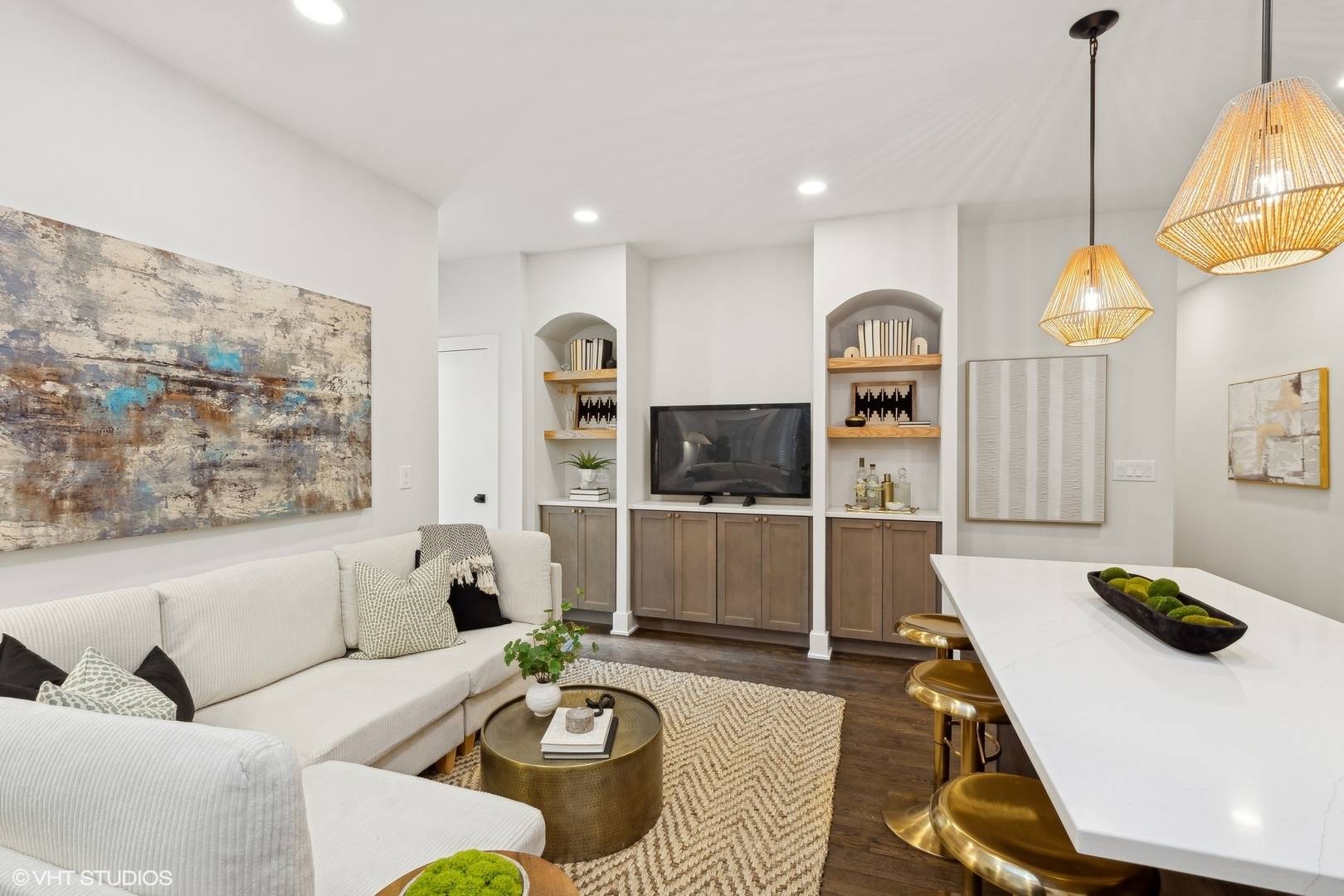 1323 West Addison Street, Unit 1A Chicago, IL 60613 - Photo 3 of 15 a living room with furniture a flat screen tv and kitchen view