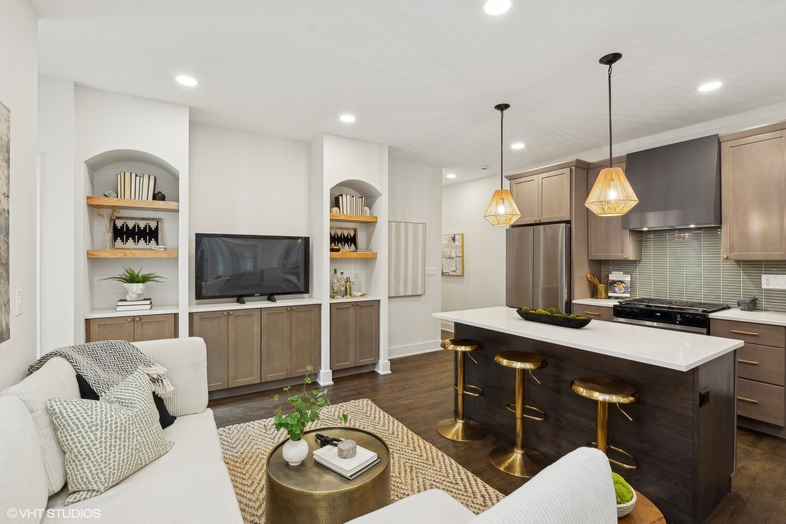 1323 West Addison Street, Unit 1A Chicago, IL 60613 - Photo 4 of 15 a living room with furniture a flat screen tv and kitchen view