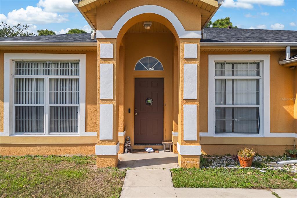 2782 Andes Way St. Cloud, FL 34769 - Photo 12 of 42 a house view with a outdoor space