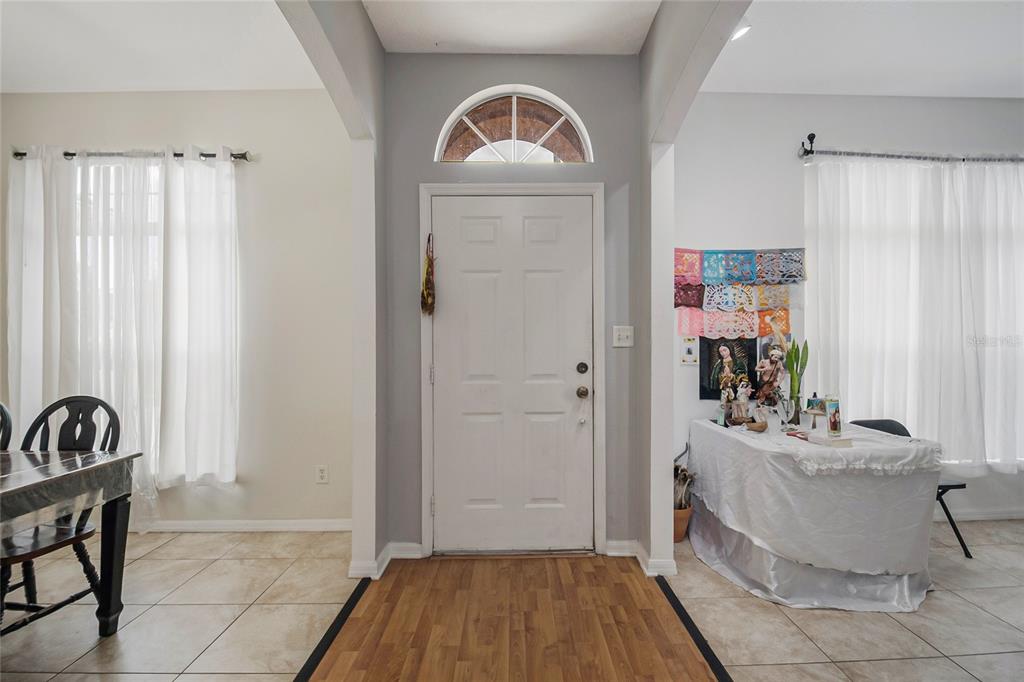 2782 Andes Way St. Cloud, FL 34769 - Photo 13 of 42 a view of a livingroom with kitchen and furniture