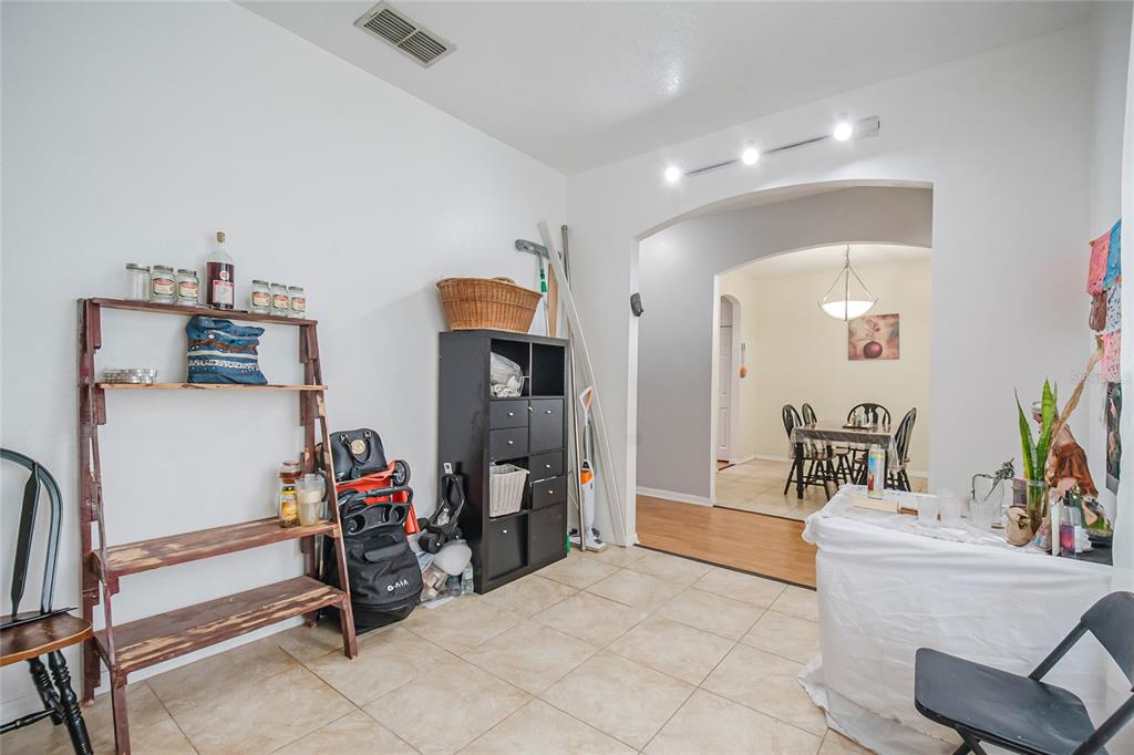 2782 Andes Way St. Cloud, FL 34769 - Photo 16 of 42 a view of room with guitars and couch
