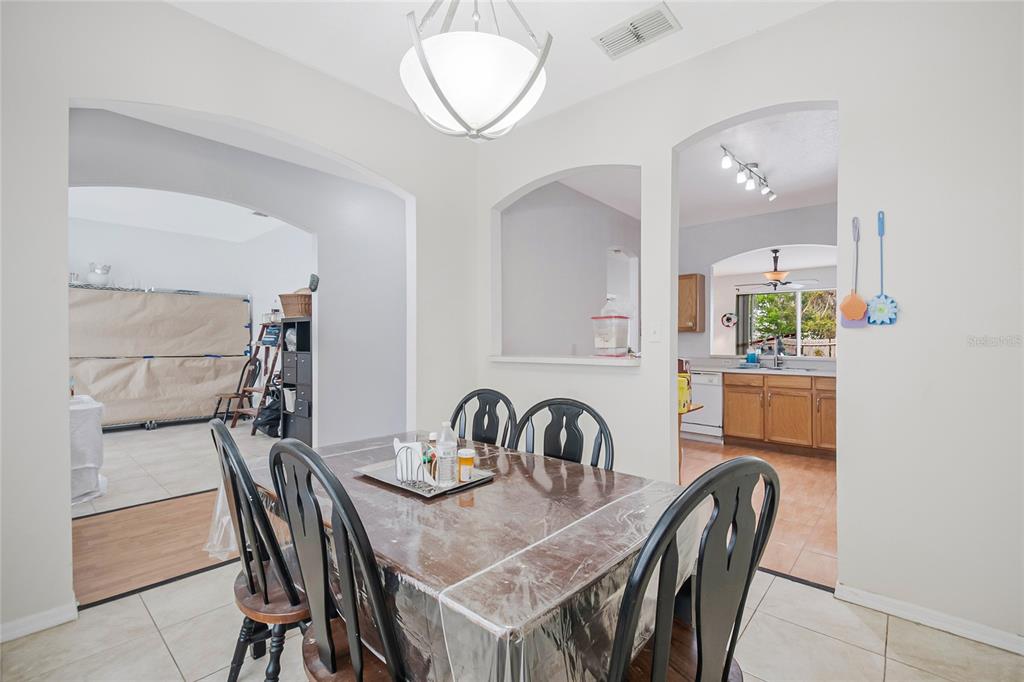 2782 Andes Way St. Cloud, FL 34769 - Photo 19 of 42 a view of a dining room and a table and chairs