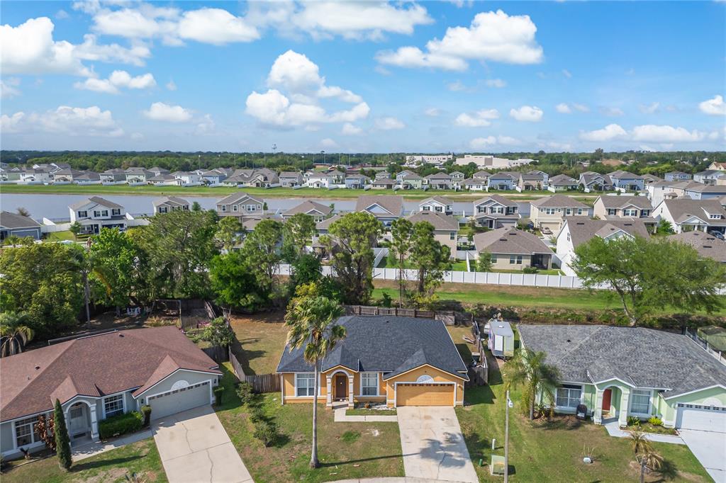 2782 Andes Way St. Cloud, FL 34769 - Photo 3 of 42 an aerial view of a house with a lake view