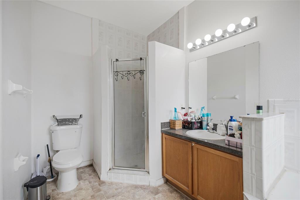 2782 Andes Way St. Cloud, FL 34769 - Photo 32 of 42 a bathroom with a sink toilet and shower