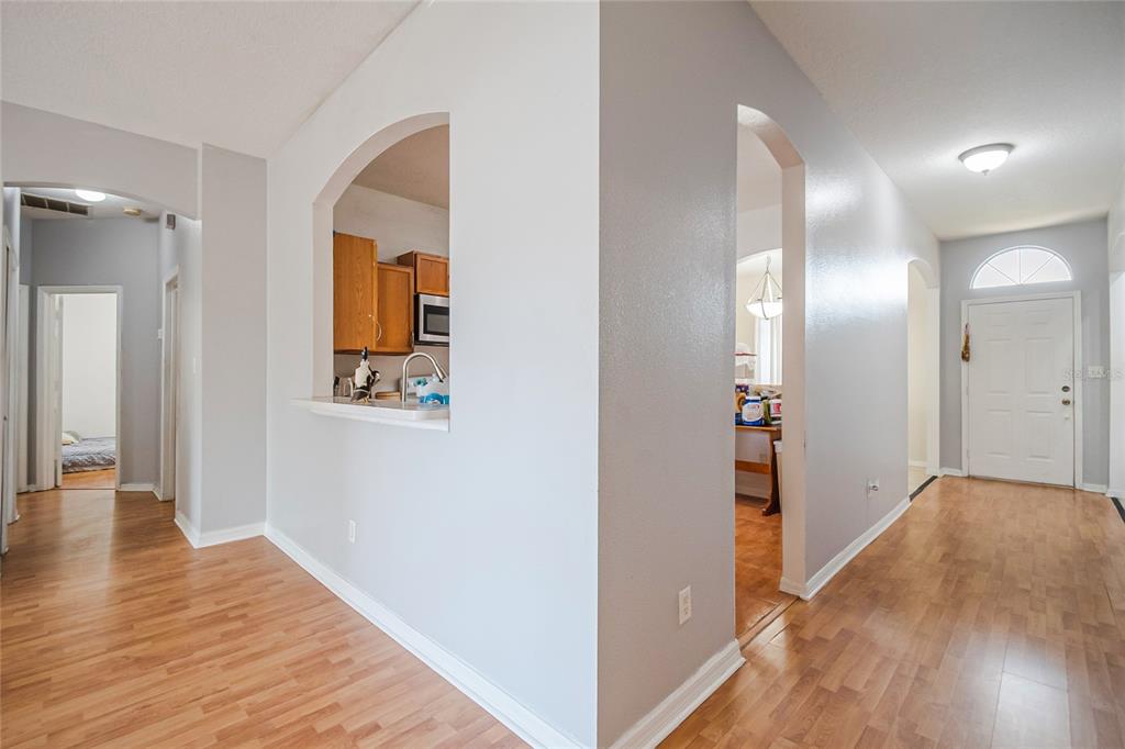 2782 Andes Way St. Cloud, FL 34769 - Photo 34 of 42 a view of a hallway with wooden floor