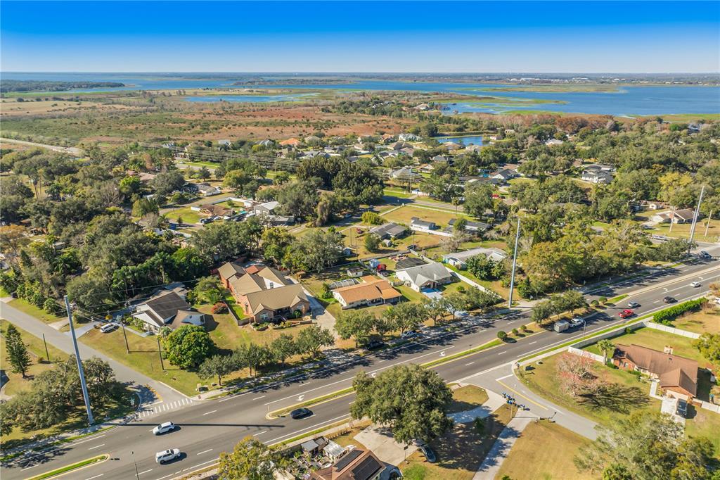 2782 Andes Way St. Cloud, FL 34769 - Photo 4 of 42 an aerial view of residential building and lake