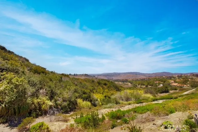a view of a city with mountains in the background