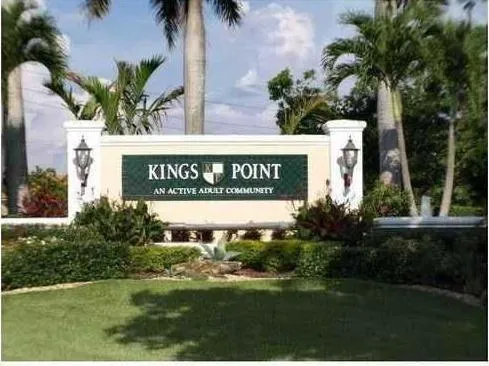 a sign on the side of the road