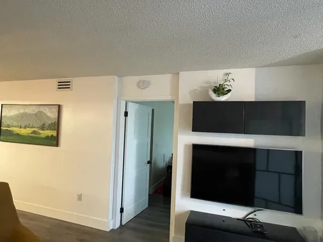 a living room with a fireplace