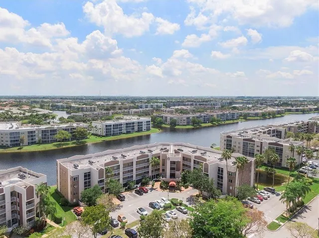a view of a garden with a bench in patio
