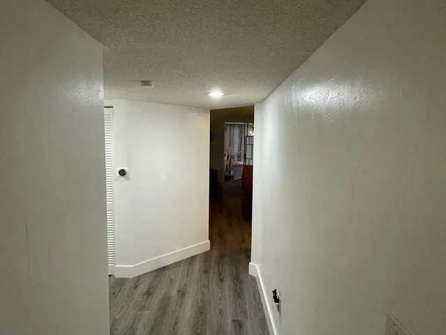 a view of hallway with stairs