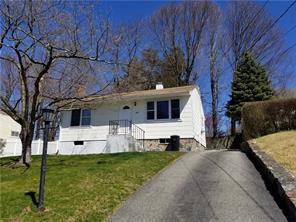 7 Cayuga Drive Peekskill, NY 10566 - Photo 1 of 1 a view of a white house with a big yard and large tree