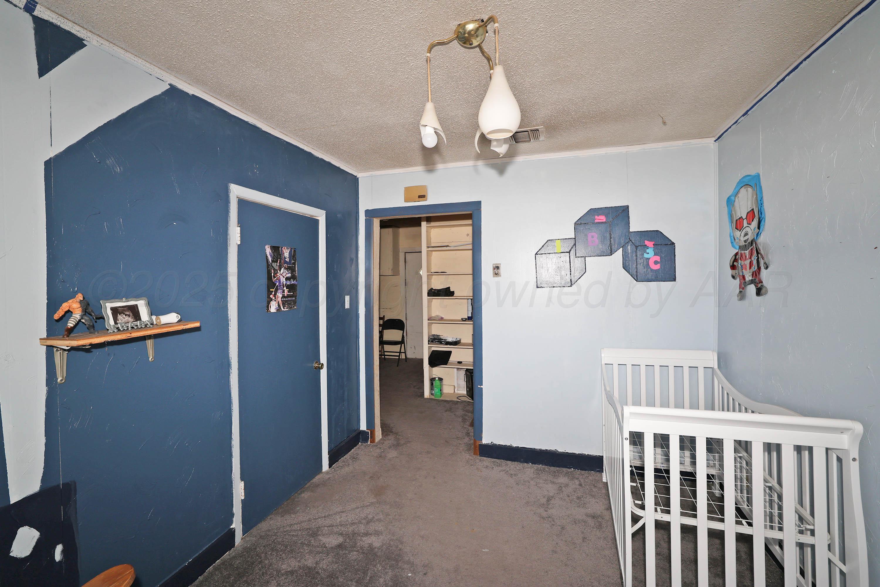 2001 Northwest 13th Avenue Amarillo, TX 79107 - Photo 18 of 35 a view of livingroom with furniture and ceiling fan
