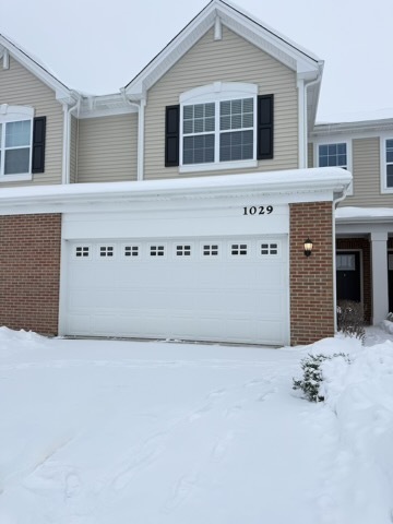 1029 Draper Road McHenry, IL 60050 - Photo 1 of 26 a view of a kitchen with white wall
