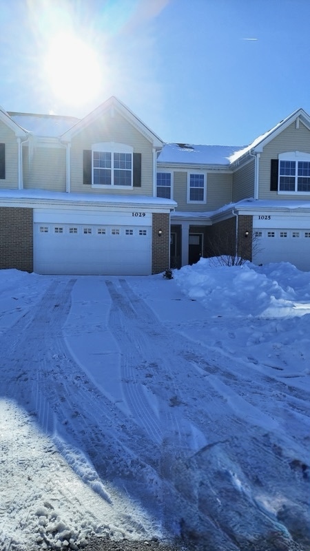 1029 Draper Road McHenry, IL 60050 - Photo 2 of 26 a view of kitchen with cabinets and wooden floor