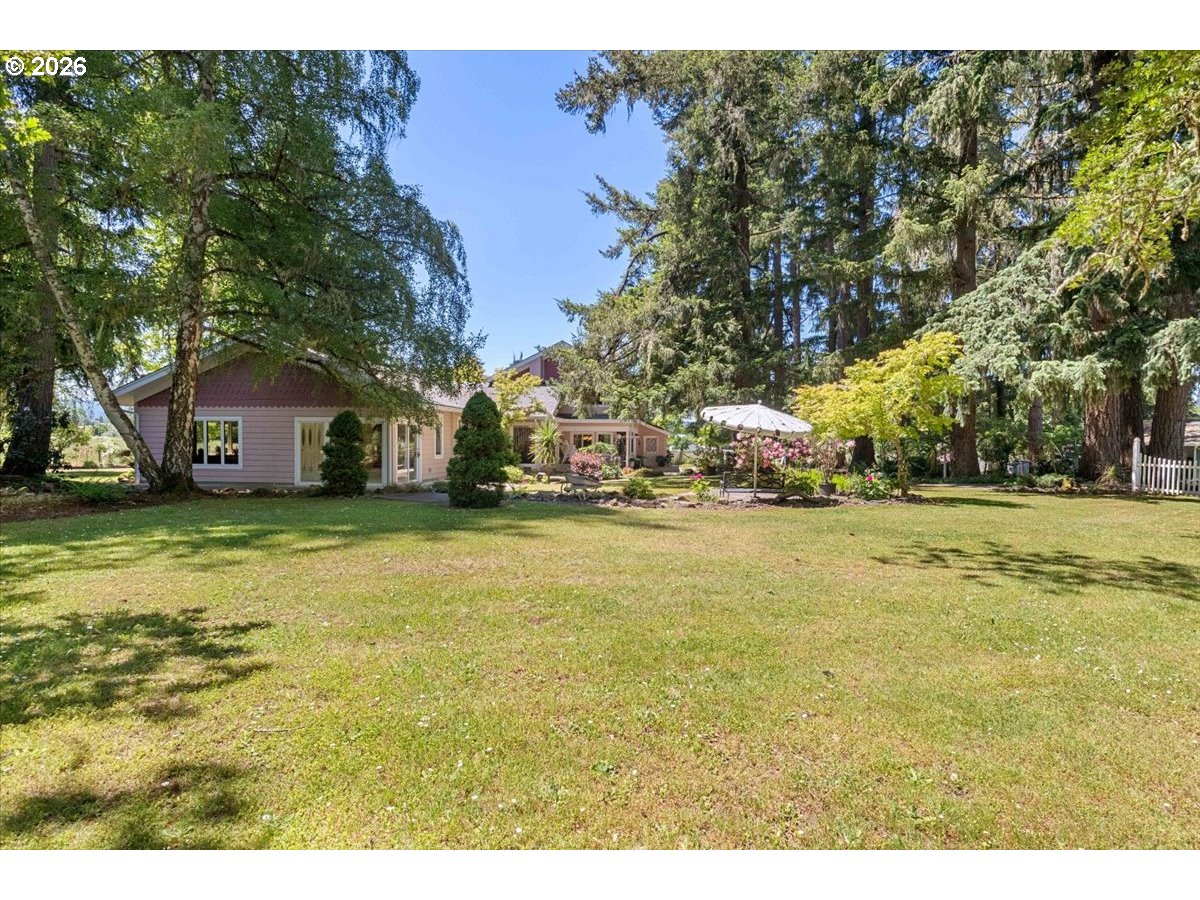 1300 Fair Oaks Road Oakland, OR 97462 - Photo 45 of 48 a house view with swimming pool in front of it