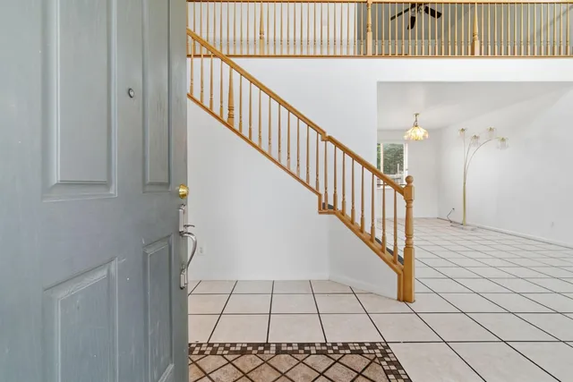 a view of entryway with wooden floor