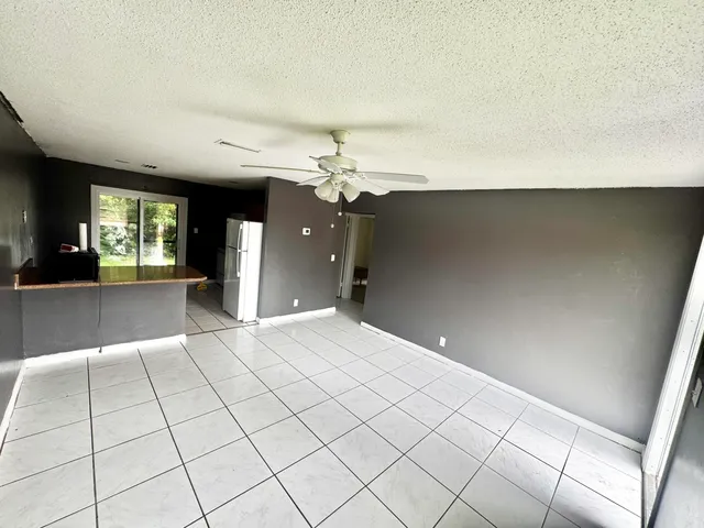 a view of a livingroom with a furniture
