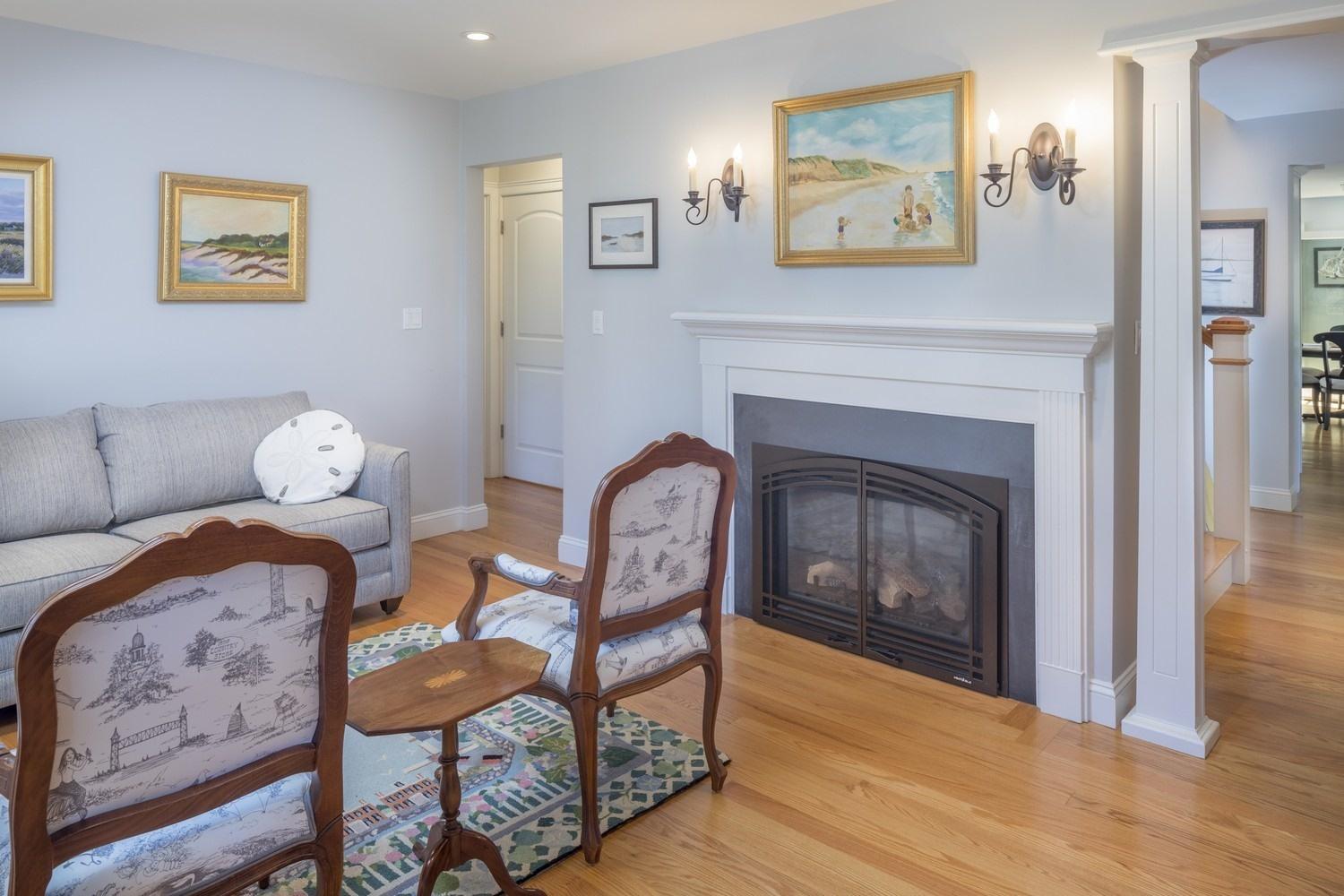 30 Barnard Road Osterville, MA 02655 - Photo 11 of 18 a living room with furniture and a fireplace