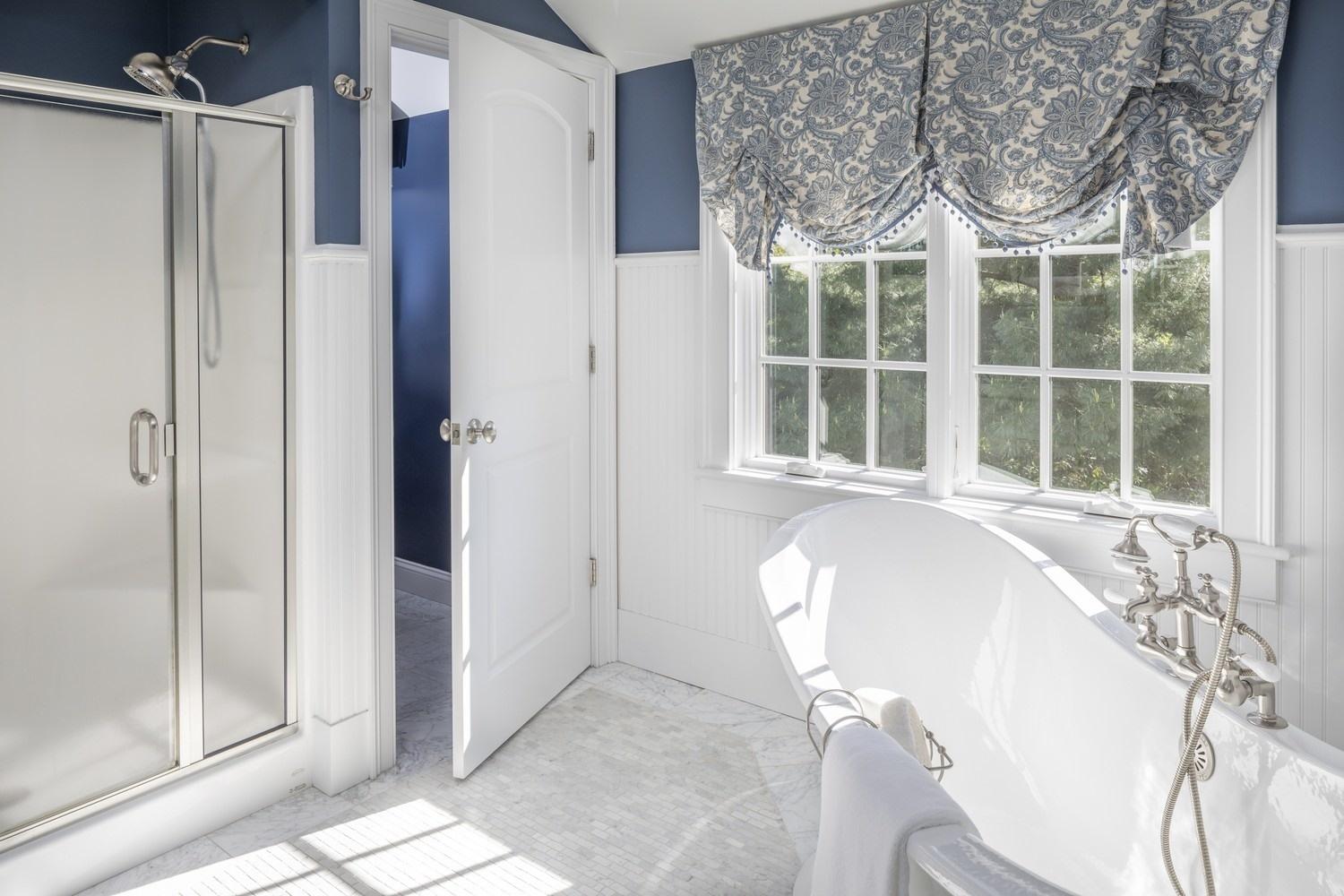 30 Barnard Road Osterville, MA 02655 - Photo 14 of 18 a bathroom with a bathtub and a shower