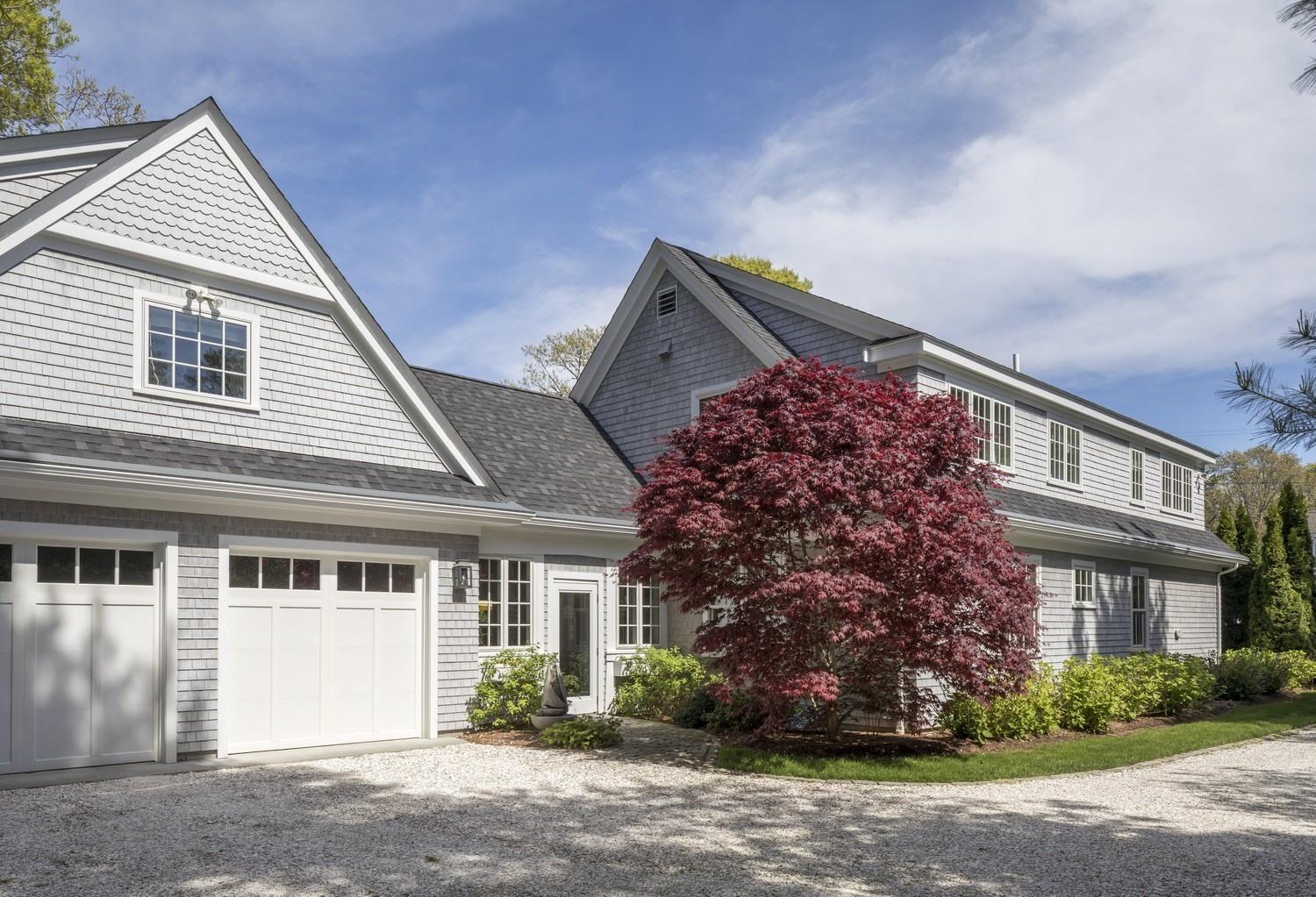 30 Barnard Road Osterville, MA 02655 - Photo 5 of 18 a front view of a house with a garden