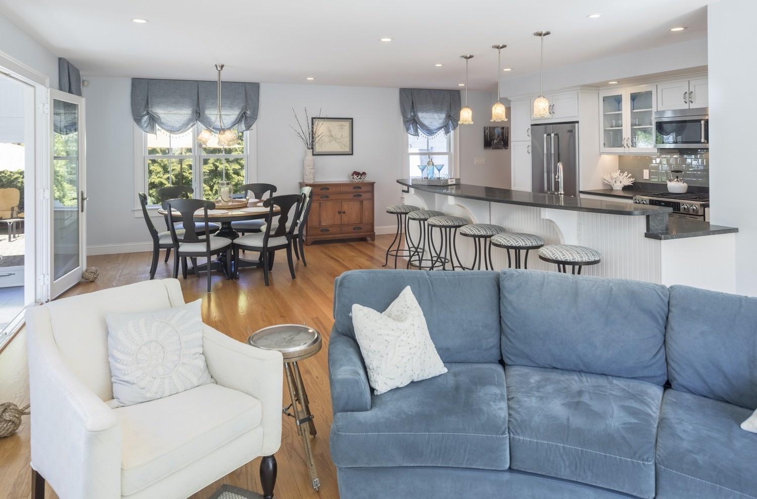 30 Barnard Road Osterville, MA 02655 - Photo 8 of 18 a living room with furniture and a large mirror