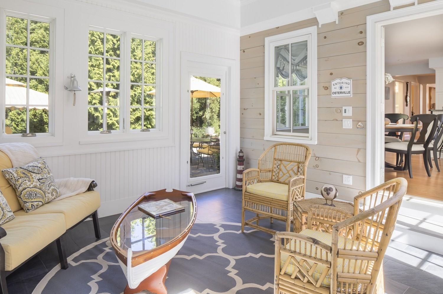 30 Barnard Road Osterville, MA 02655 - Photo 9 of 18 a living room with furniture and a large window