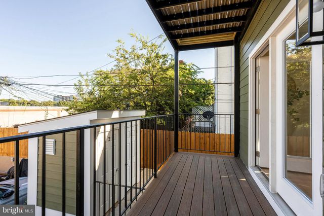 a car parked in front of a house