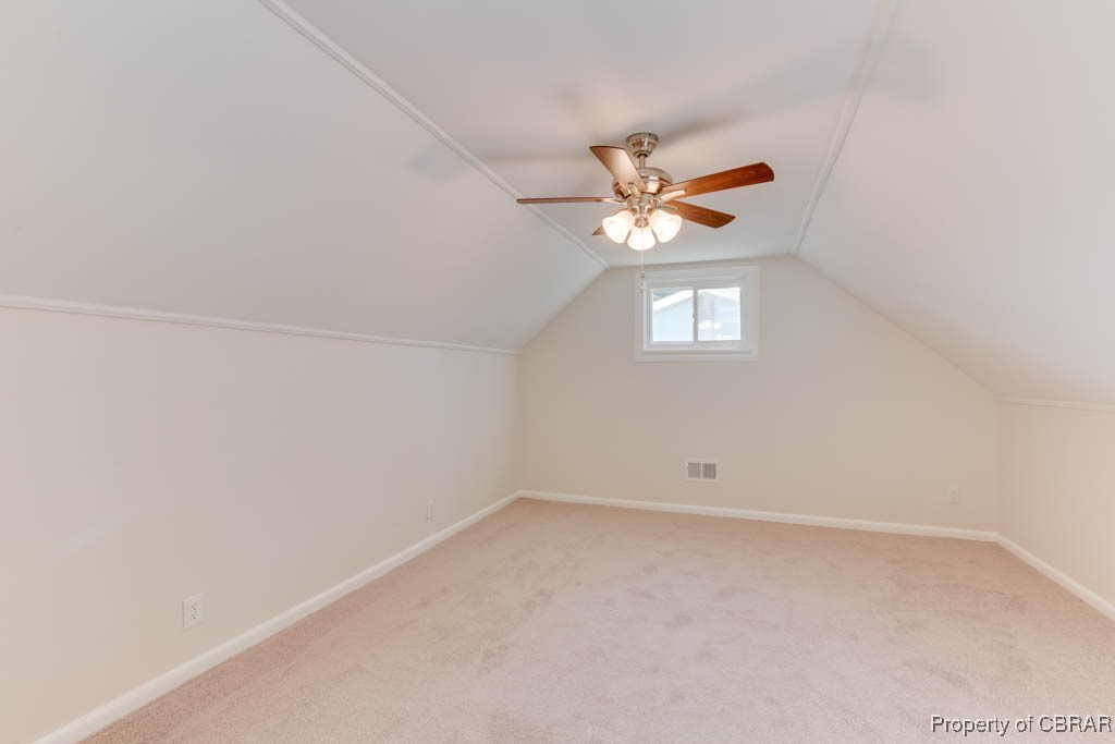 3310 West Weaver Road Hampton, VA 23666 - Photo 21 of 28 an empty room with a window and a fan