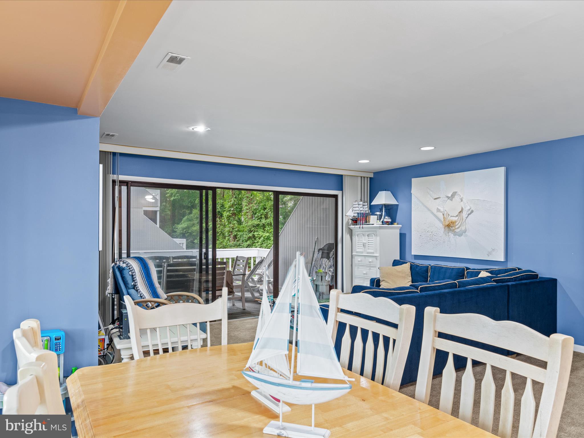 39346 Racquet Lane, Unit 8502 Bethany Beach, DE 19930 - Photo 18 of 33 a view of a dining room with furniture window and outside view