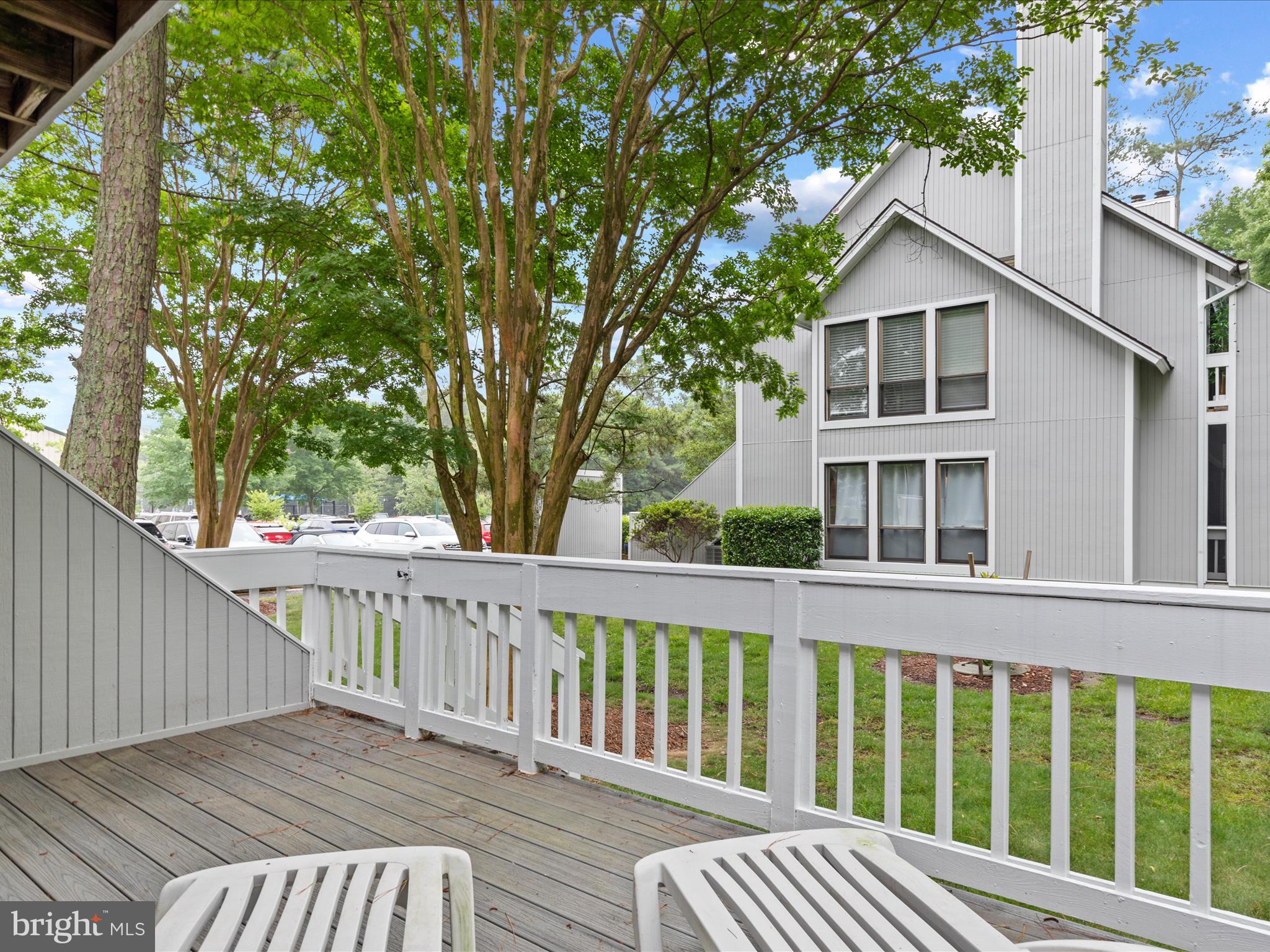 39346 Racquet Lane, Unit 8502 Bethany Beach, DE 19930 - Photo 30 of 33 a view of a house with a deck
