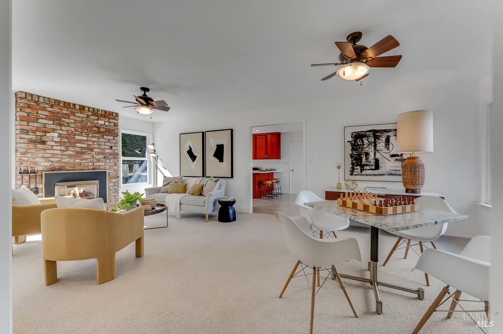 975 Vía Della Rosa Sebastopol, CA 95472 - Photo 1 of 1 a living room with furniture and a fireplace