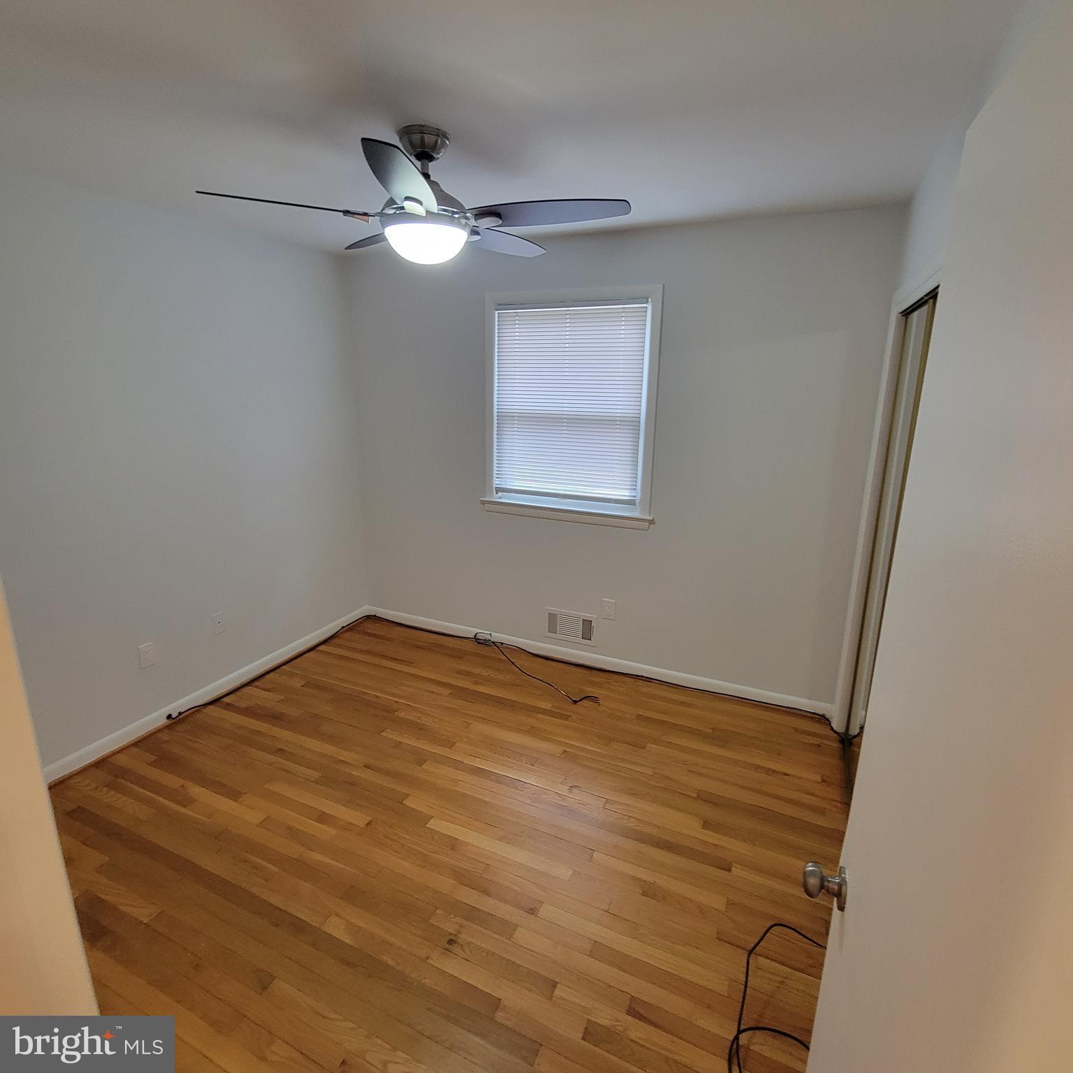 18320 Metz Drive Germantown, MD 20874 - Photo 14 of 31 a view of a room with wooden floor